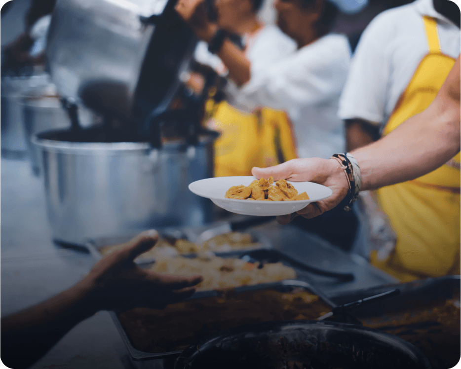 Serving food at a community kitchen