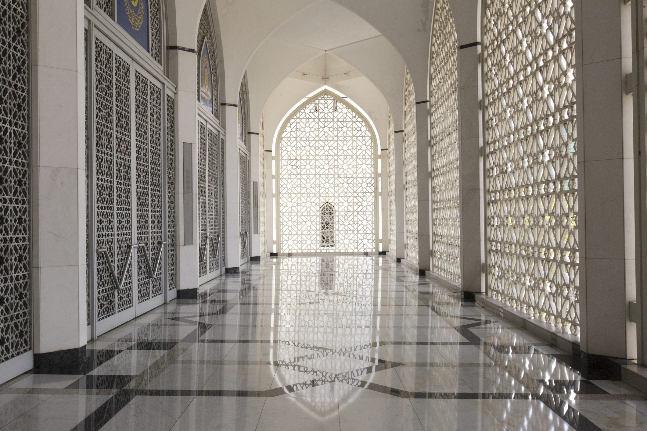 Ornate corridor with intricate lattice design