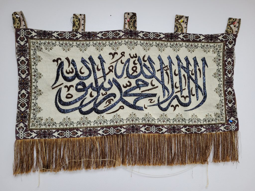 Ornate Islamic art tapestry with intricate design