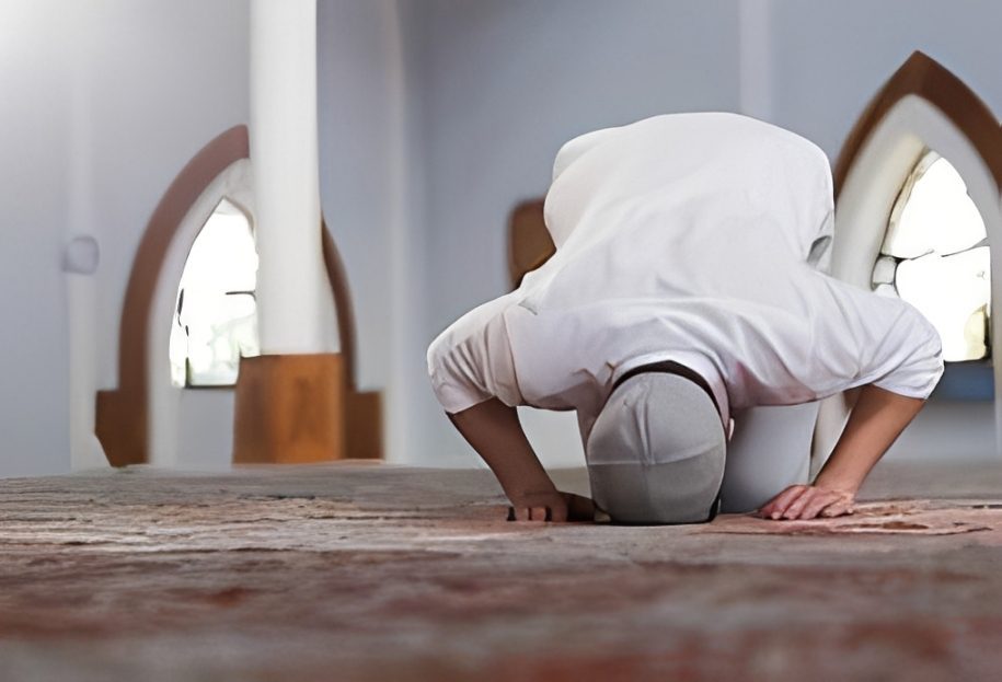 Individual in prayer position