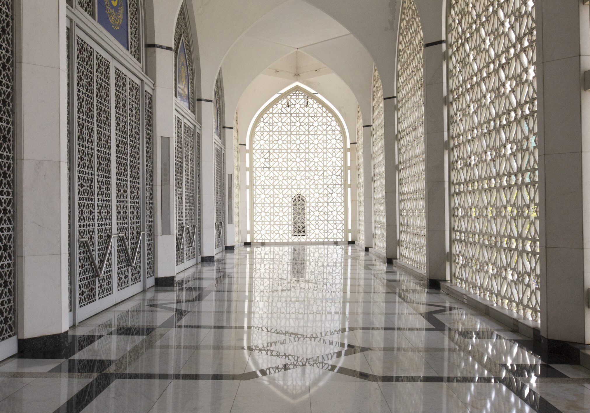 Ornate corridor with intricate lattice design