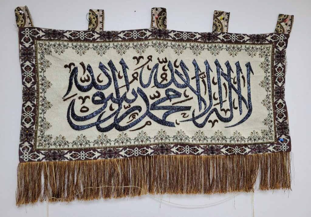 Ornate Islamic art tapestry with intricate design